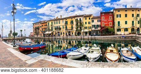 Scenic village Lazise with colorful houses, lake Lago di Garda. Veneto region. nov. 2020 Italy