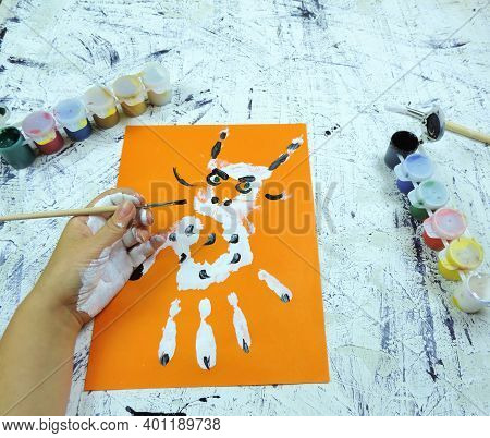Drawn Horned Animal On Orange Background. Diy, Year Of The Ox Craft Activity For Kids. Symbol Of The