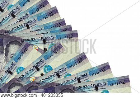 100 Philippine Piso Bills Lies Isolated On White Background With Copy Space Stacked In Fan Close Up.