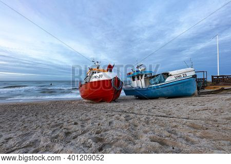 Uniescie, West Pomeranian Voivodeship Poland - December, 26, 2020: Fishing Boats On The Seashore. A
