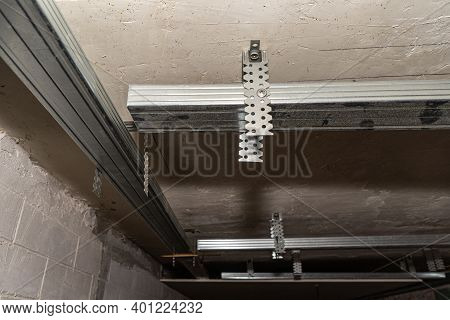 Ceiling Lining With Plasterboard Panels. Frame For Ceiling Drywall. Drywall Installation. Metal Fram