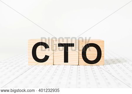 A Word Cto On Wooden Cubes. Business Concept. Business And Finance