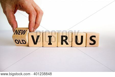 Mutated Covid Virus Symbol. Male Hand Turns A Cube And Changes Words 'old Virus' To 'new Virus'. Bea