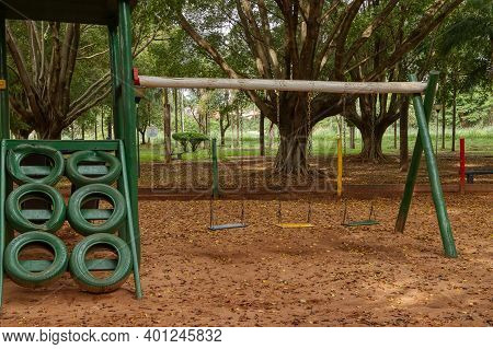 Cassilandia, Mato Grosso Do Sul, Brazil - 12 21 2020: Wooden Children's Playground With Sand Floor I