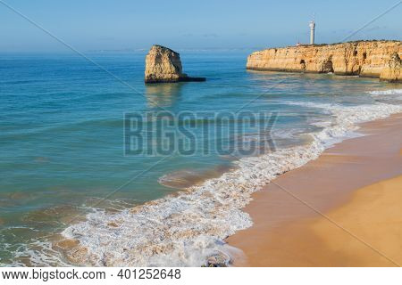 The famous beach of Praia dos Caneiros. This beach is a part of famous tourist region of Algarve.