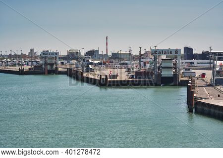 Calais, France - July 31 2020: Calais harbor shoot from ferry leaving the port