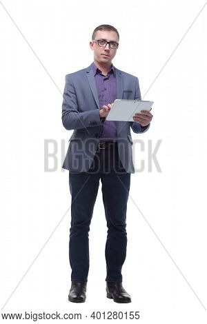Full lenth portrait of cool businessman using electronic tablet