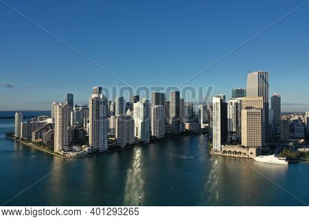 Miami, Florida - December 27, 2020 - Aerial View Of City Of Miami And Entrance To Miami River On Sun