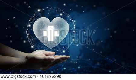 Hand Holding A White Heart With White Cross Symbol. World Map Background. Health Care, Health Insura