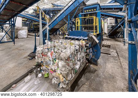 Household Waste Sorting And Recycling Plant. Press For Pressing Plastic Bottles.