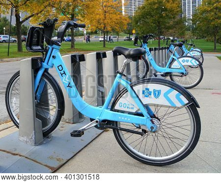 Chicago, Illinois, U.s.a - October 13, 2018 - Divvy Bicycle Rentals On Its Station To Get Around The