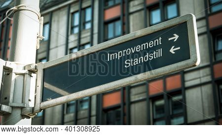 Street Sign The Direction Way To Improvement Versus Standstill