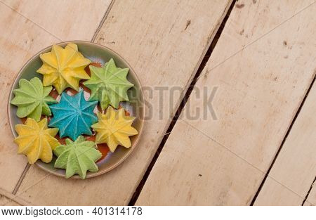 Sweet, Crispy, Multi-colored Meringue In A Plate.