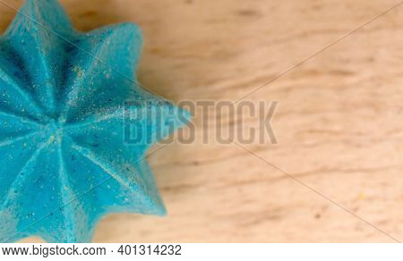 Blue, Sweet, Crispy Meringue Close-up On A Wooden Background.