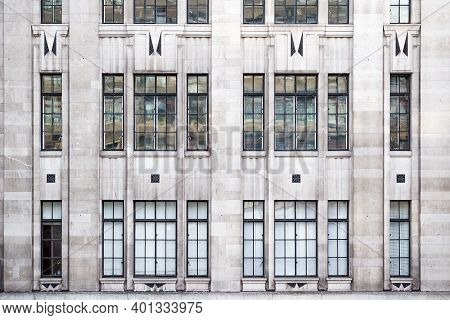 Facade Of A Building With Classical Windows In London, Uk
