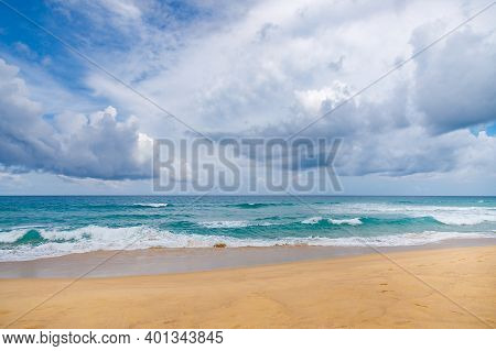 Beautiful Sea Sunny Landscape On The Beach. Light Waves Of Blue Color Spread All Over The Beach Smoo
