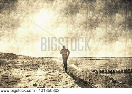 Man In Sportswear Running On Sea Coast. Successful Runner. Summer Activity. Sport Recreation.  Calot