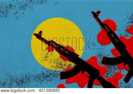 Palau Flag And Two Black Ak-47 Rifles In Red Blood. Concept For Terror Attack Or Military Operations