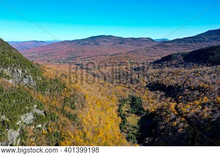 Panoramic View Of Late Fall Foliage In Smugglers Notch, Vermont.