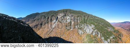 Panoramic View Of Late Fall Foliage In Smugglers Notch, Vermont.