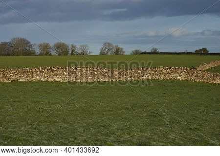 Dry Stone Walls Marking Field Boundaries In The Woolley Valley, An Area Of Outstanding Natural Beaut