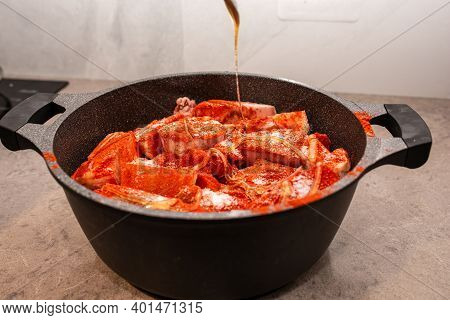Woman Preparing Food, Pour Honey Or Sauce On The Meal.
