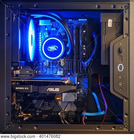 Open Computer System Unit With Neon Blue Light Water Cooling - Moscow, Russia, December 23, 2020