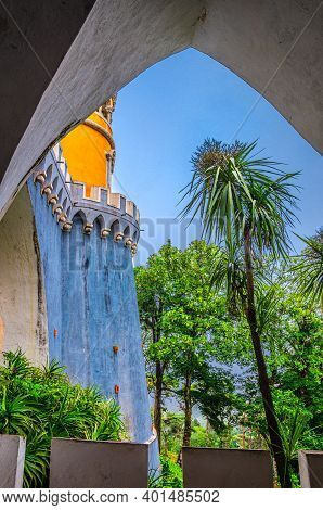 Sintra, Portugal, June 14, 2017: Pena Palace With Colorful Stone Walls And Green Trees, Palacio Naci