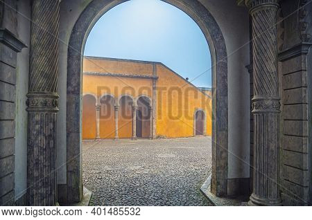 Sintra, Portugal, June 14, 2017: Cobblestone Courtyard Of Pena Palace With Arches And Columns, Palac
