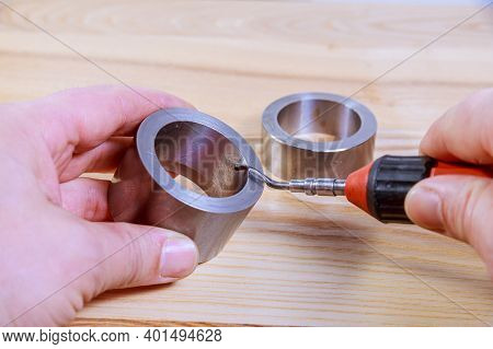 The Process Of Deburring Metal. Deburring Tool For Metal, Wood, Aluminum, Copper And Plastic.