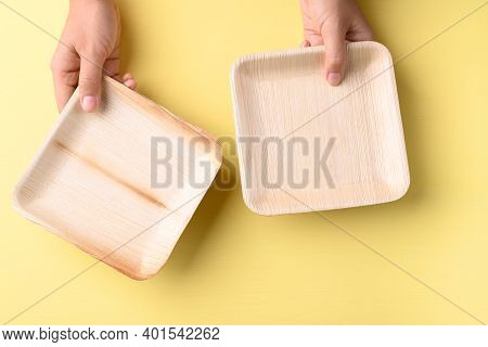 Hand Holding Betal Palm Leaf Plate (biodegradable, Compostable, Disposable Or Eco Friendly Plate) On