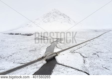 Buachaille Etive Mor Covered In Snow During Winter Aerial View