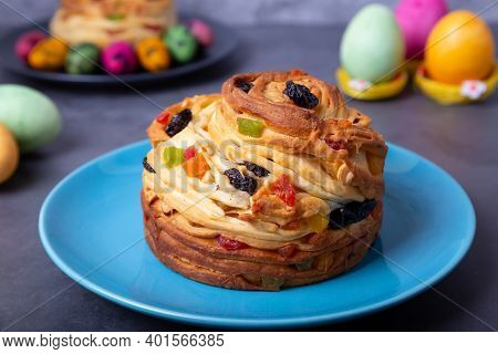 Craffin (cruffin) With Raisins, Nuts And Candied Fruits. Easter Bread Kulich And Painted Eggs. Easte