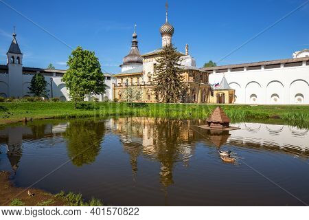Courtyard Of The Rostov Kremlin, Church Of Hodegetria Is Reflected In Water Of Pond. Rostov Veliky, 