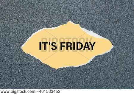 It's Friday - Written On Torn Yellow Paper. Gray Background
