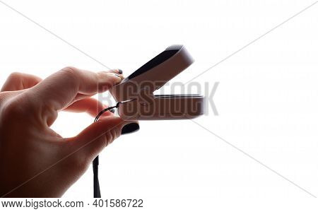 Female Hands Measure The Pulse With A Compact Electronic Pulse Oximeter. Oxygen Saturation, Heart Ra
