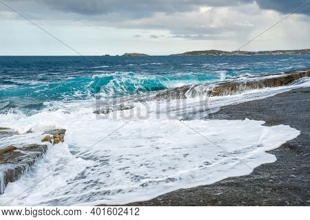 Rough Seas From Storm Bella Wash Onto The Rocky Mediterranean Coastline At Punta Caldanu In The Bala