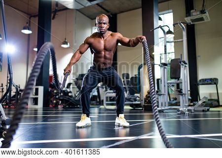 Spain Man In White Cotton T-thirt Wearing Mask While Working Out In Gym