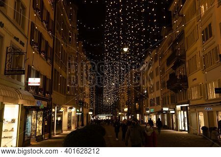 Christmas Shopping Under Traditional Christmas Lights Called Lucy In Rennweg, A Side Street Of Bahnh