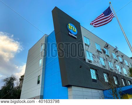The Exterior Of A Tru Hotel By Hilton Located In Mobile, Alabama.