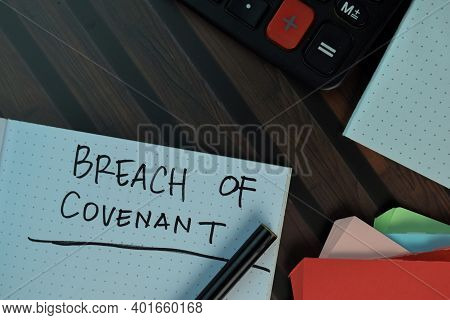 Breach Of Covenant Write On Sticky Notes Isolated On Wooden Table. Business Or Finance Concept