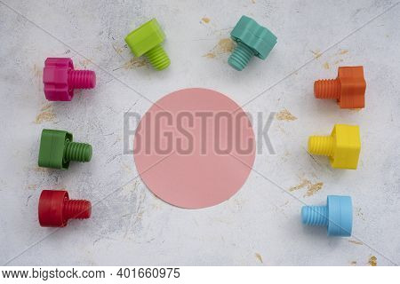Educational Constructor For Children, Nuts And Bolts In The Form Of Geometric Shapes. Mock Up Backgr