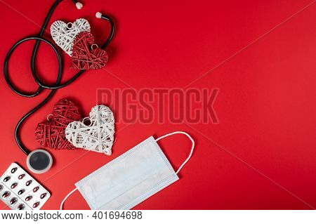 White Medical Mask With Various Red Hearts For Valentines Day And Coronavirus Concept, Copy Space Or