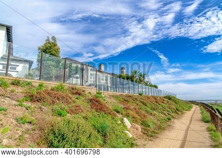 Picturesque Residential Scenery In Huntington Beach California On A Cloudy Day