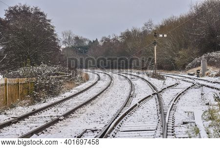 Railway Tracks In A Light Sprinkling Of Sno With Signal Where Th Tracks Divide In Uttoxeter, Staffor