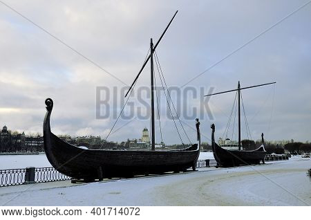 Viking Boat Drakkar On The Embankment Of The City Of Vyborg