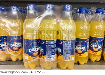 Belgrade, Serbia - December 27, 2020: Logo Of  Orangina On Bottles For Sale In Belgrade. Orangina Is