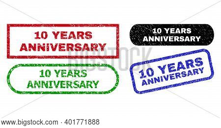 10 Years Anniversary Grunge Seals. Flat Vector Grunge Seals With 10 Years Anniversary Caption Inside