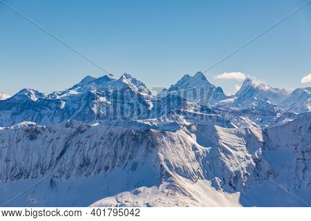 Snowcapped Wetterhorn, Lauteraarhorn And Finsteraarhorn In Swiss Alps