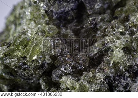 Close Up On A Green Olivine Mineral.